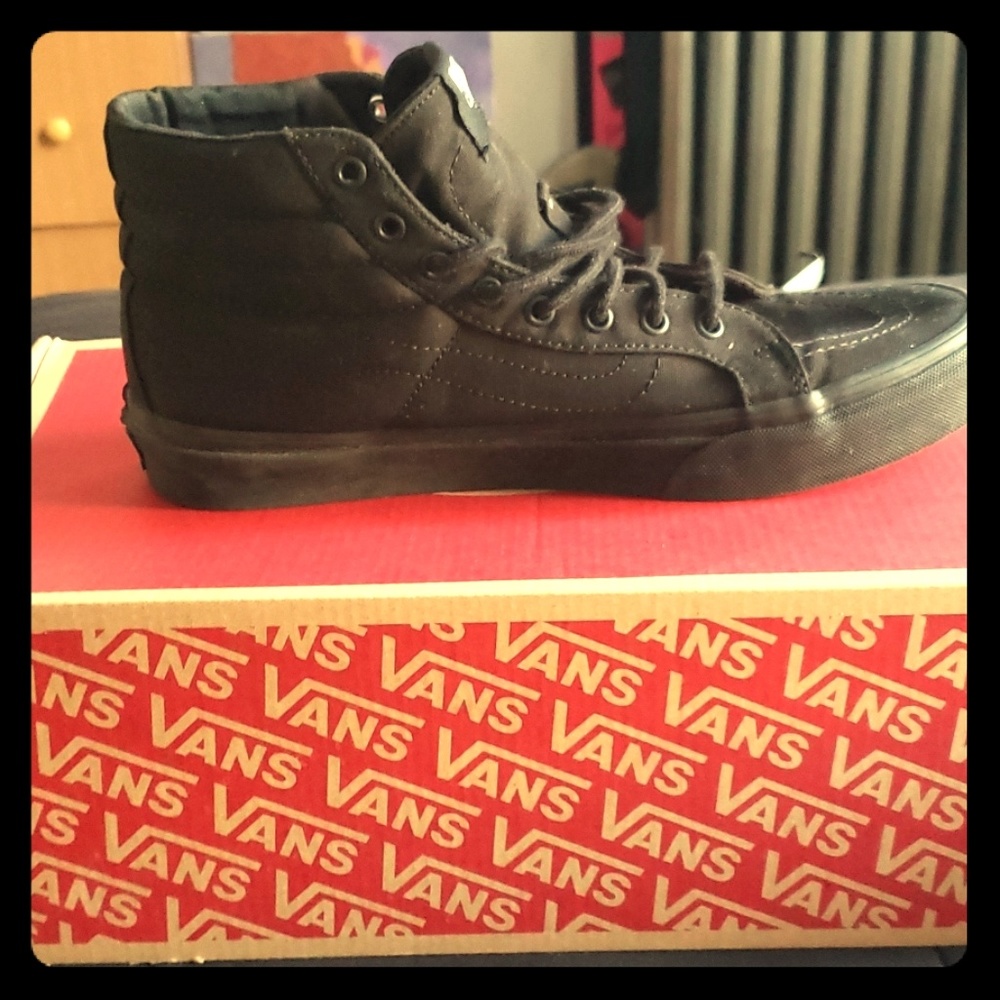 Black / black high top Vans